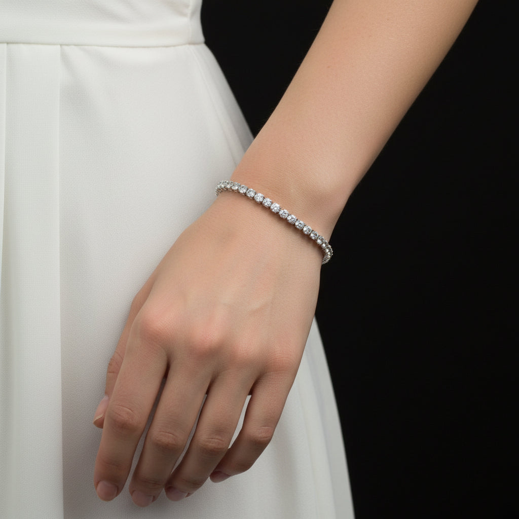 Silver bracelet with clear stones on a black background
