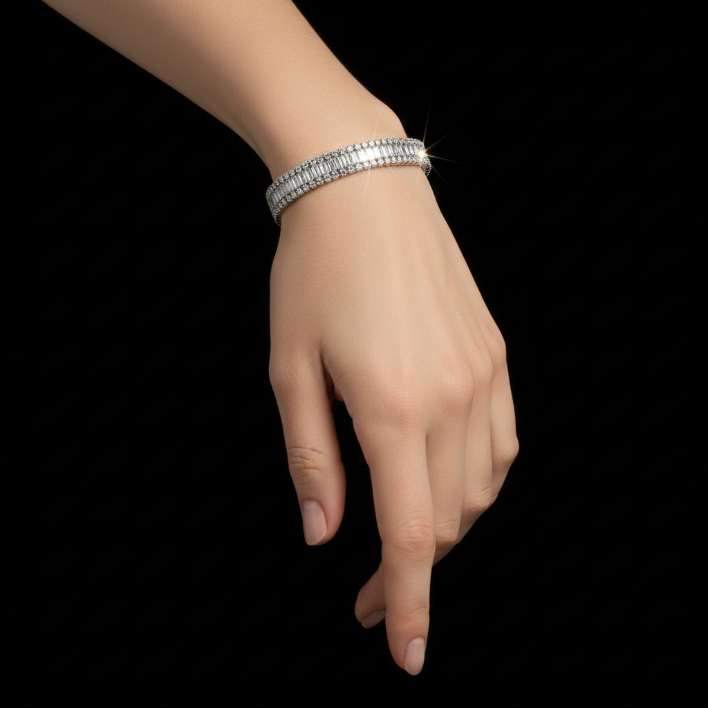 Silver bracelet on a dark gray background