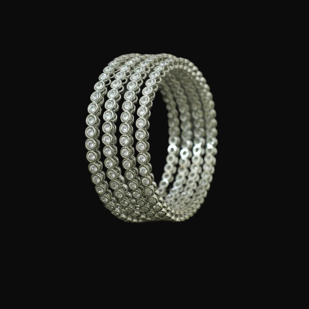 Set of silver bangles on a black stand with 'Saheli' branding.
