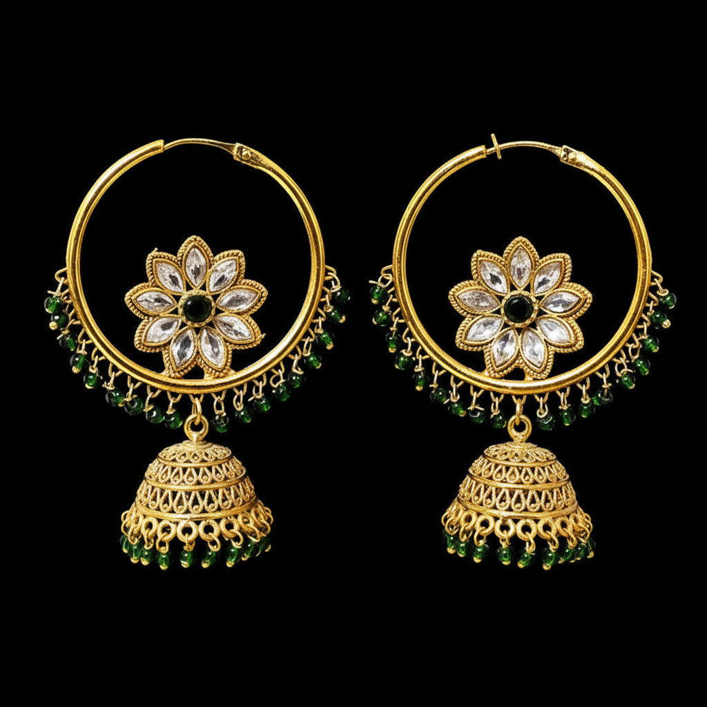 Gold earrings with floral design and green beads on a dark background, branded 'Saheli'.