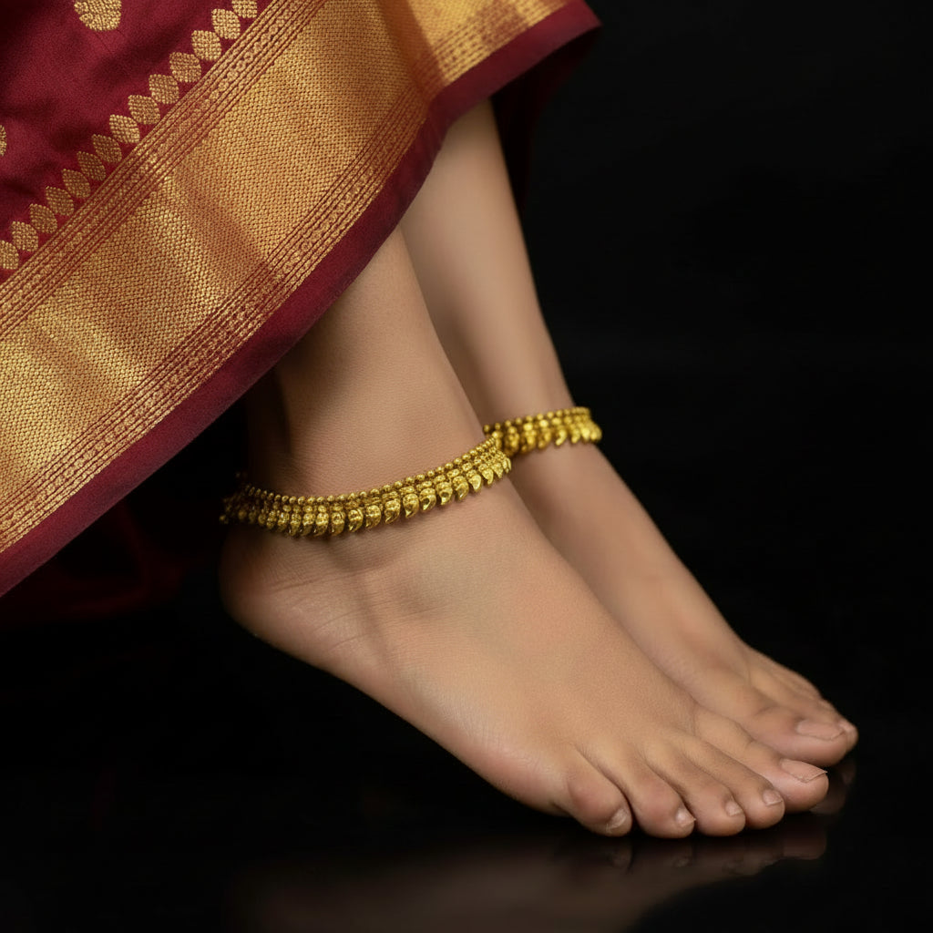 Gold necklace on a black background with 'Saheli' branding.