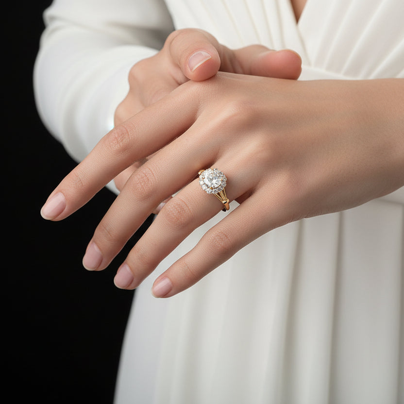 Diamond ring on a black-gloved hand with 'SAHELI' branding.