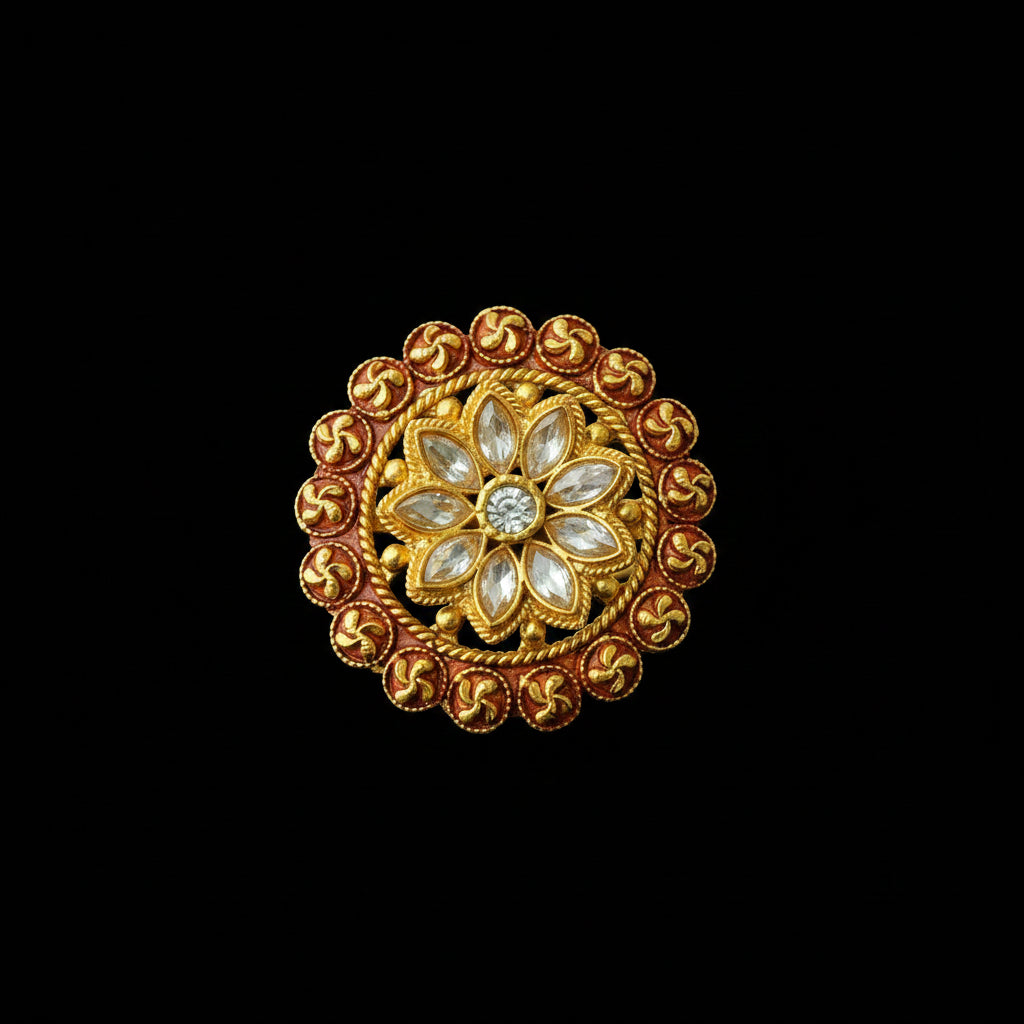 A circular gold-toned ornamental brooch or decorative pin with a floral center and a border of small red and gold motifs, shown on a dark gray background. The brand name 'SAHELL MY BEST FRIEND' is visible in the upper left corner.