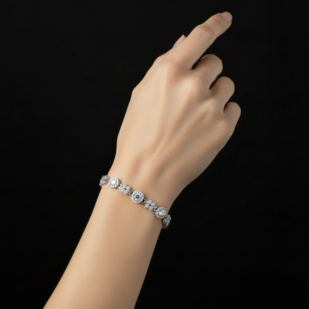 Silver bracelet with crystals on a black background, featuring the brand 'Saheili'.