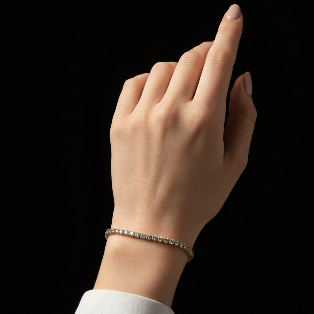Gold bracelet with clear stones on a black background