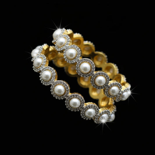 Pearl necklace with gold accents on a black background, featuring the brand 'SAHELI'.