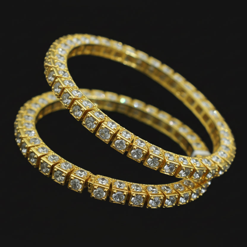 Gold bracelet with diamond accents on a black mannequin hand, branded 'Saheli'.