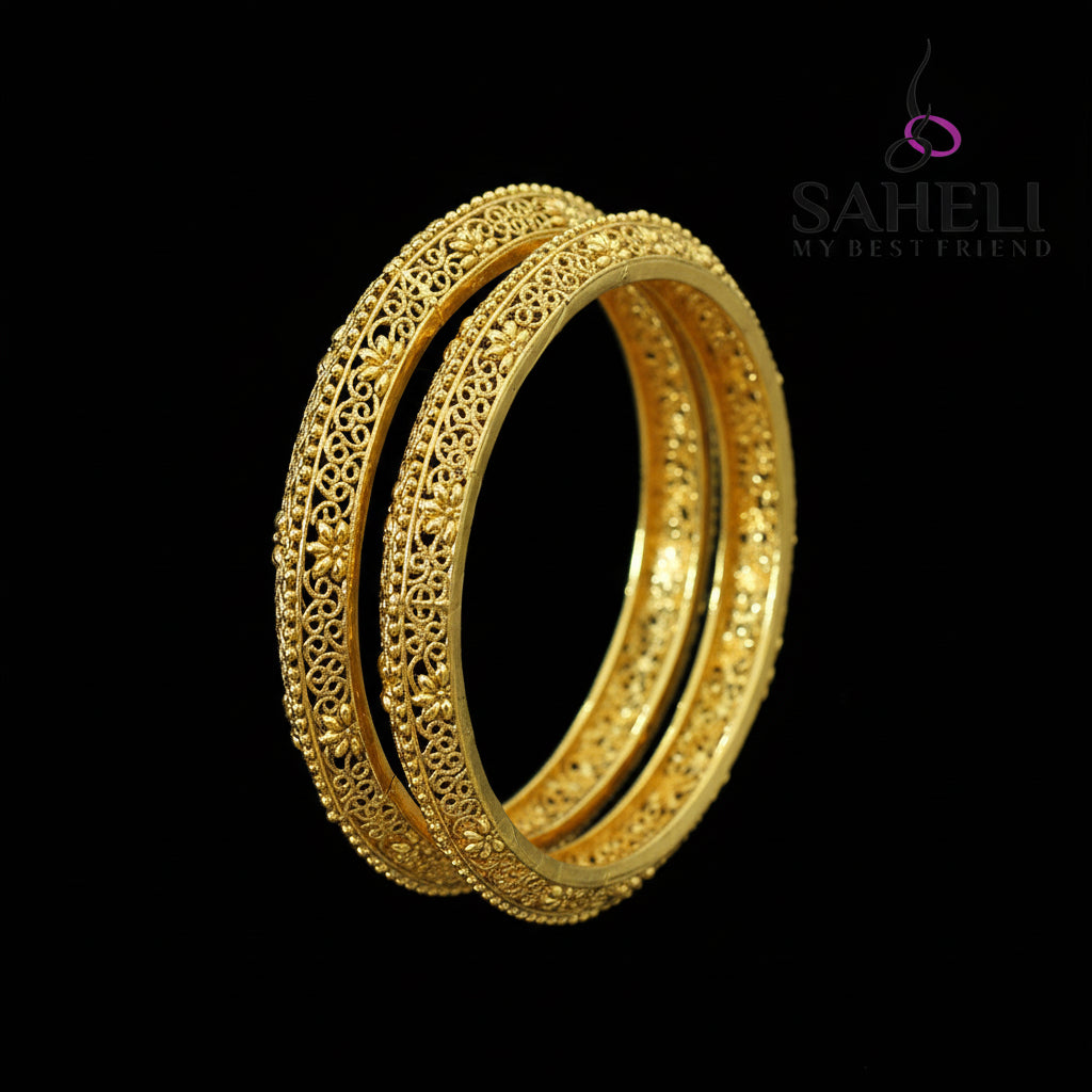 Gold bangles on a dark background with 'Saheli' branding.