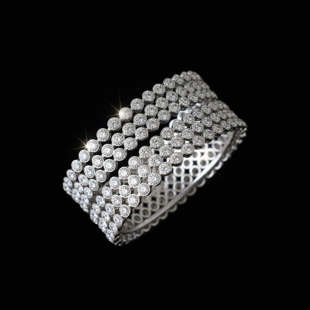 Silver bracelet on a gray cushion with 'SAHELI' branding.