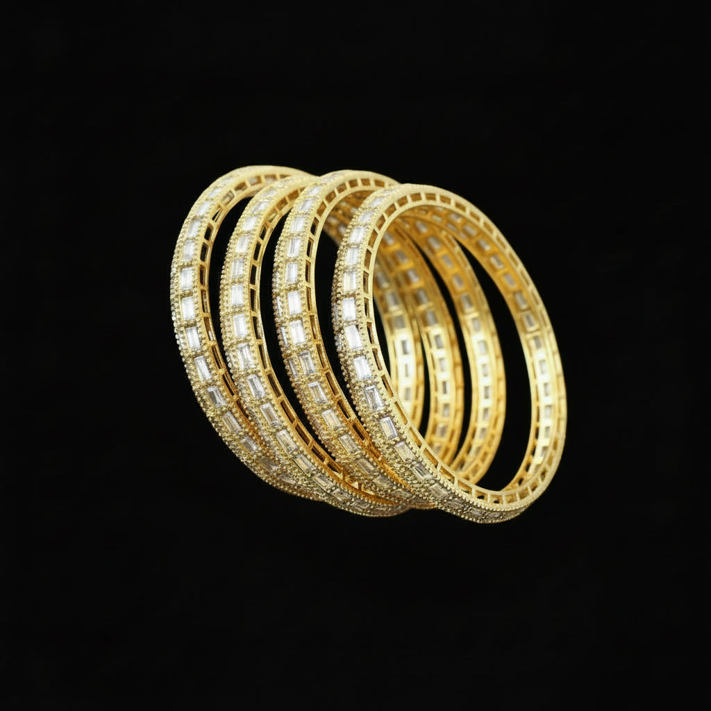 Gold bangles with diamonds on a stand against a gray background, featuring the brand 'Saheli'.