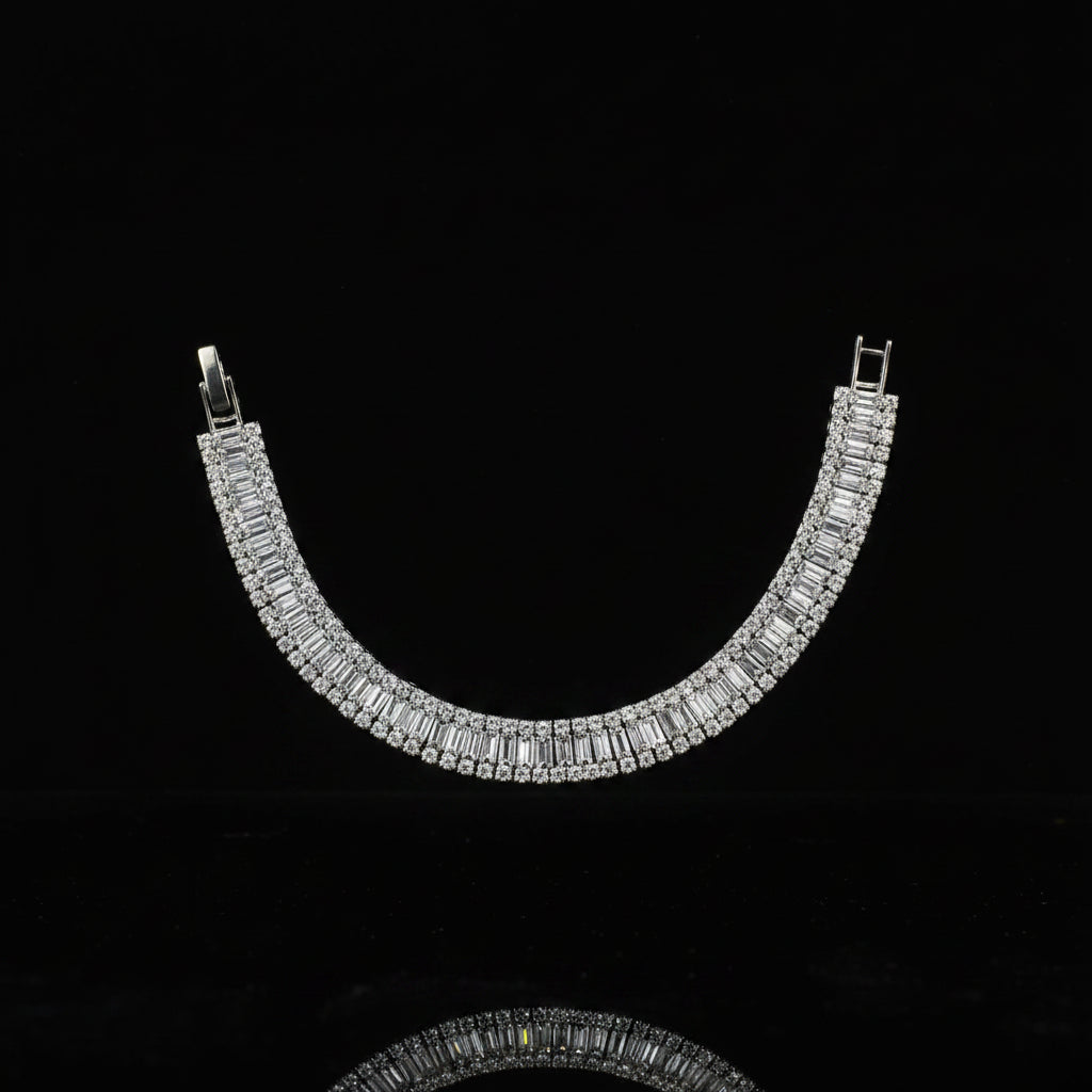 Silver necklace with clear stones on a dark background