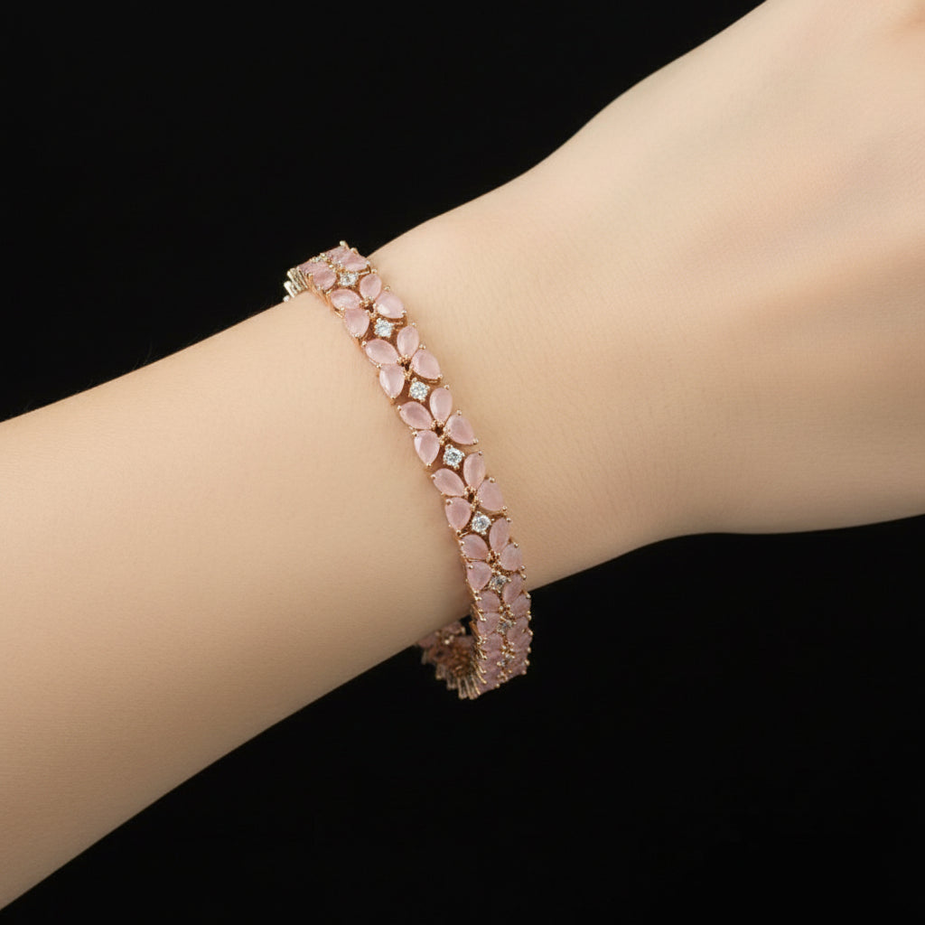 Bracelet with pink stones on a dark surface