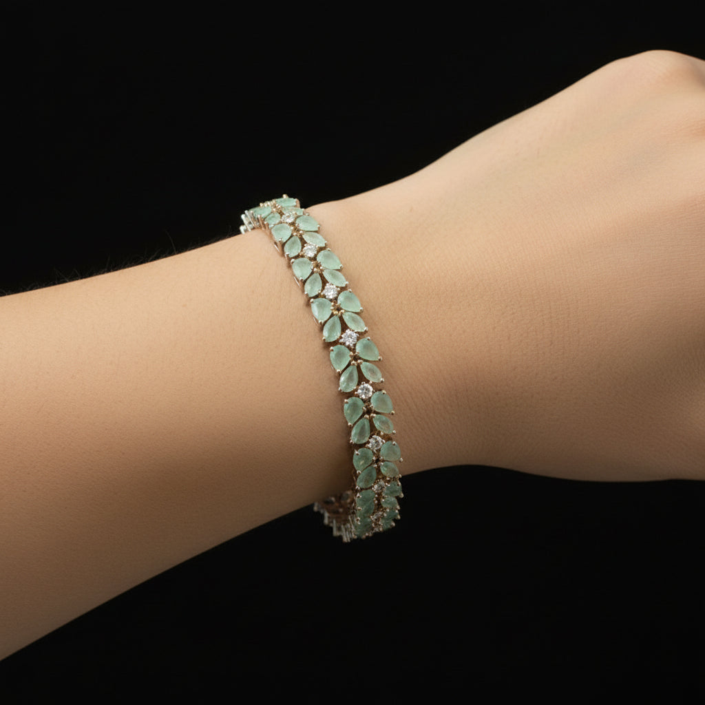 Green gemstone bracelet on a dark background