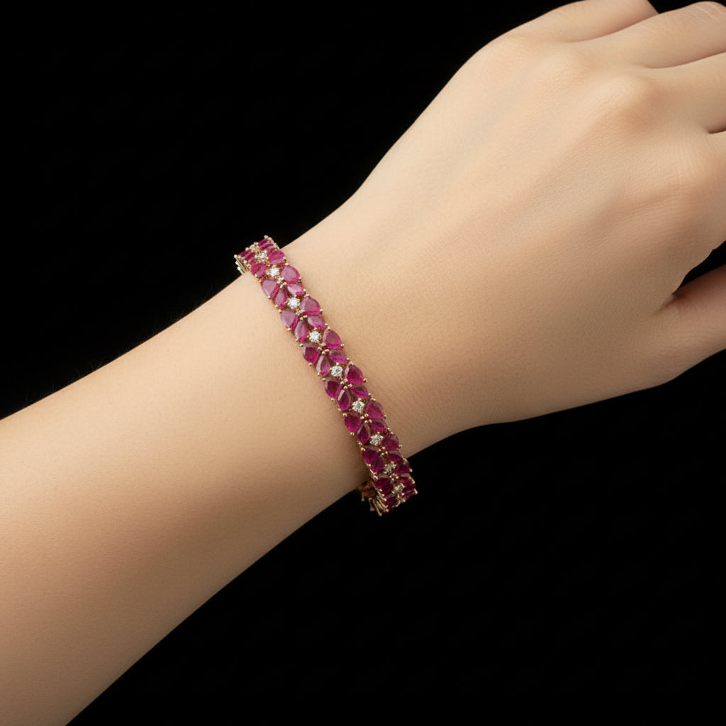 Bracelet with red gemstones on a dark background