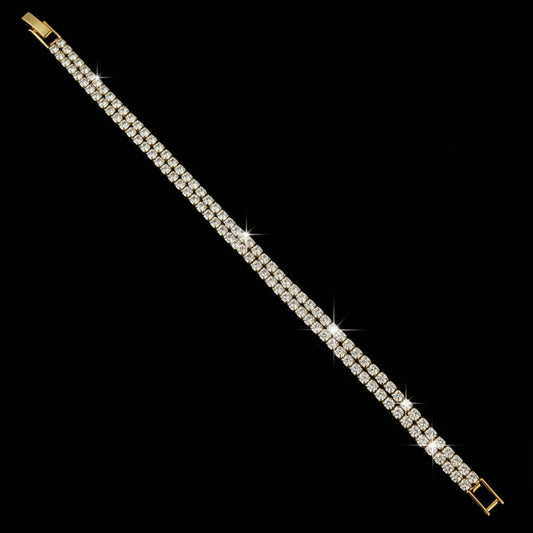 Gold bracelet on a dark gray background
