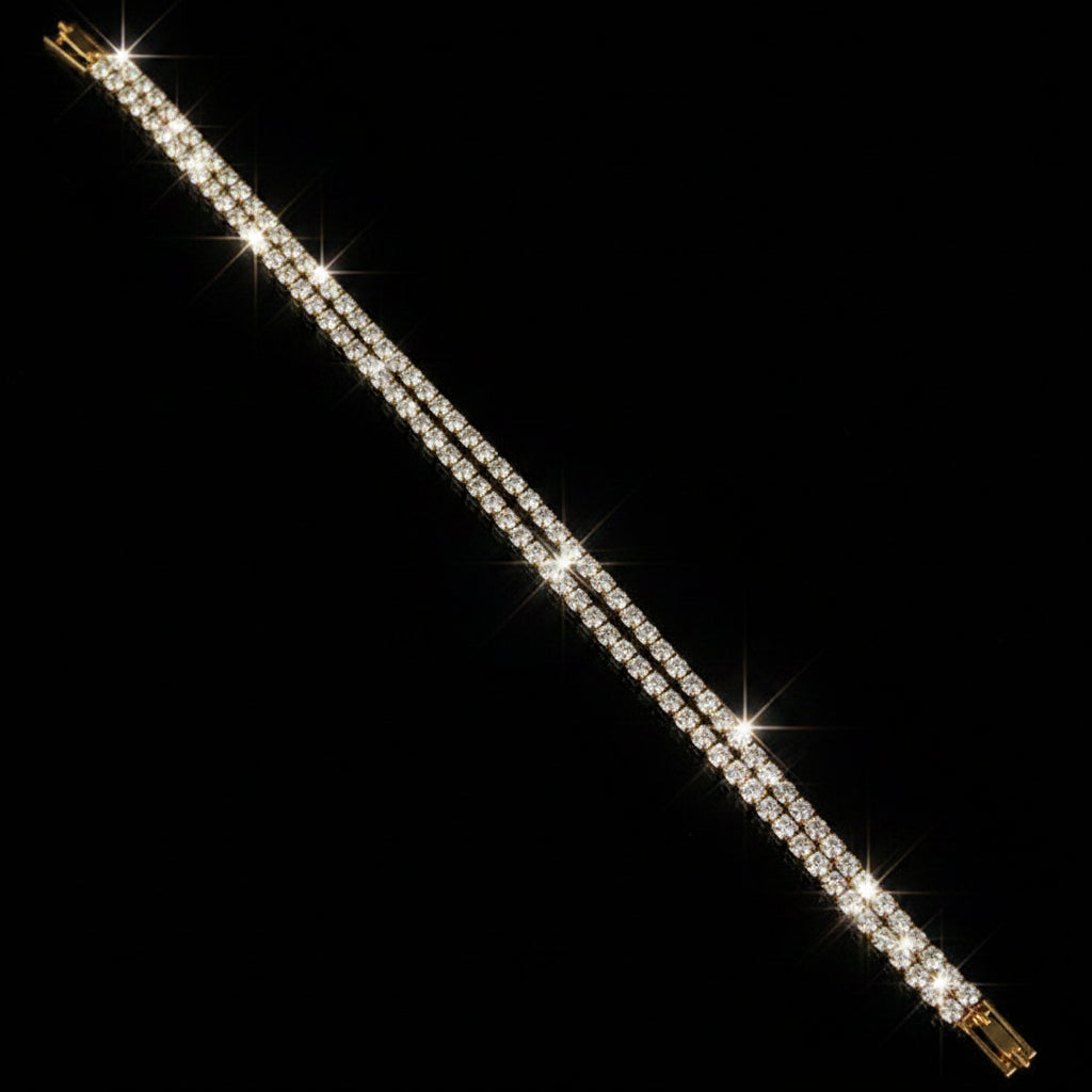 Gold bracelet on a dark gray background