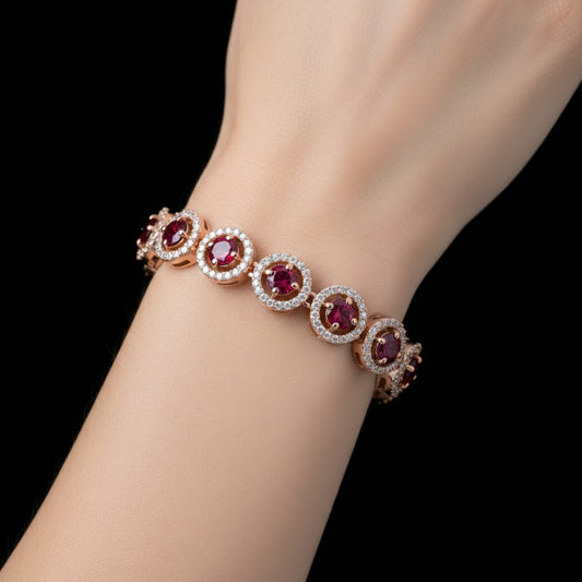Jewelry bracelet with pink gemstones on a dark surface, branded 'Saheli'.