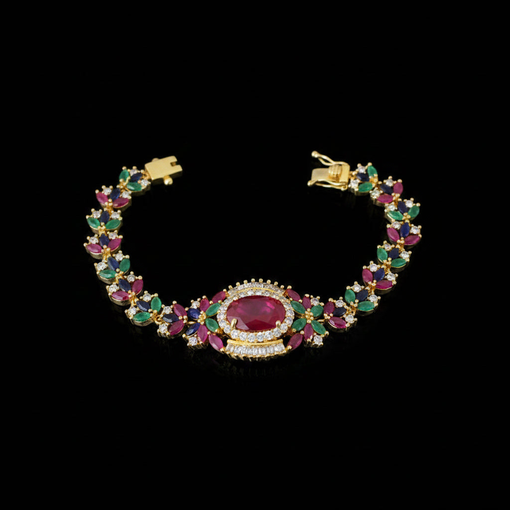 Colorful gemstone bracelet with gold accents on a dark background, featuring the brand 'Saheli'.