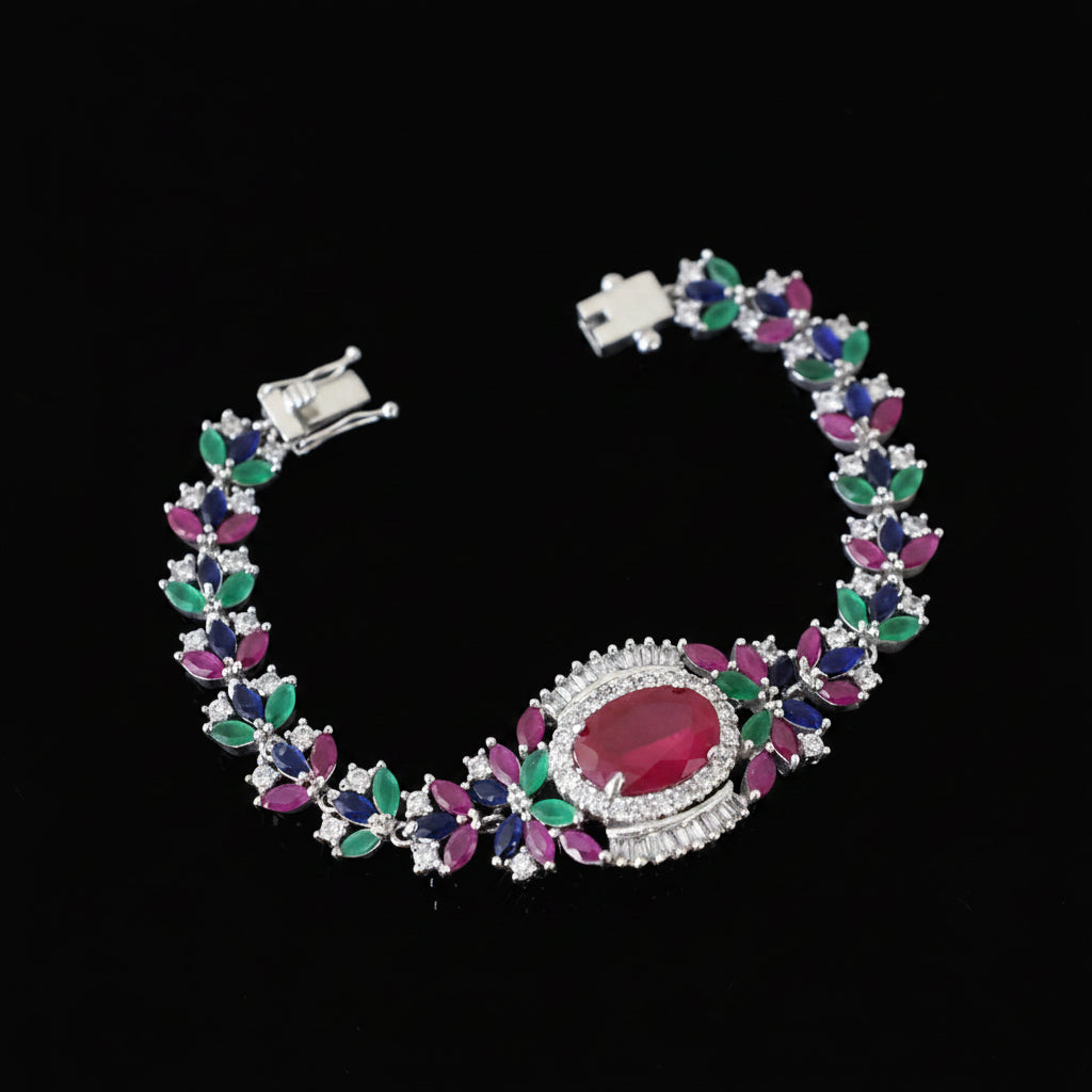 Colorful gemstone bracelet with silver accents on a black background, featuring the brand 'Saheli'.