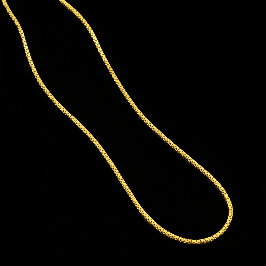 Gold chain on a gray background with 'Saheli' branding.