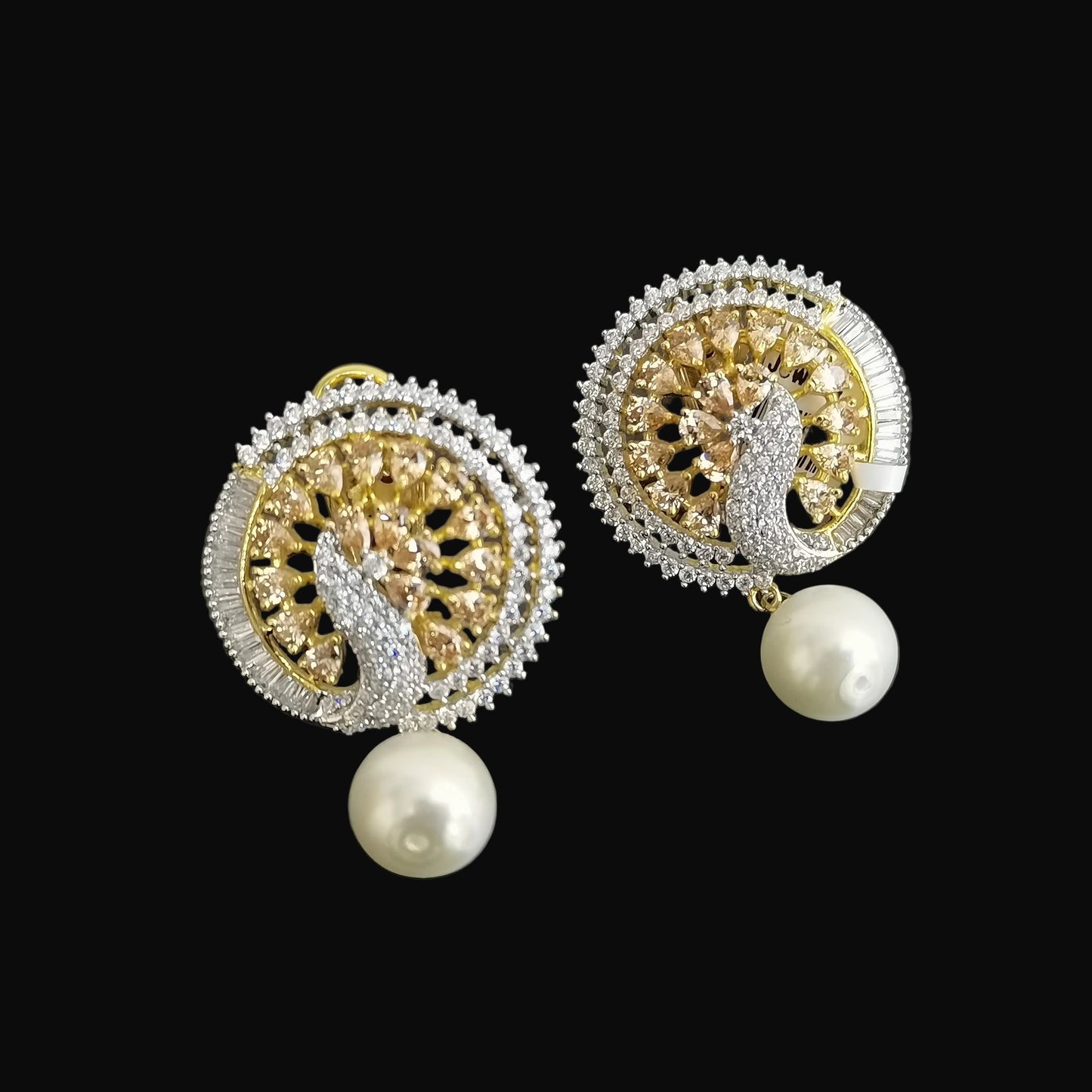 Gold and pearl earrings on a dark background with 'Saheli' branding.