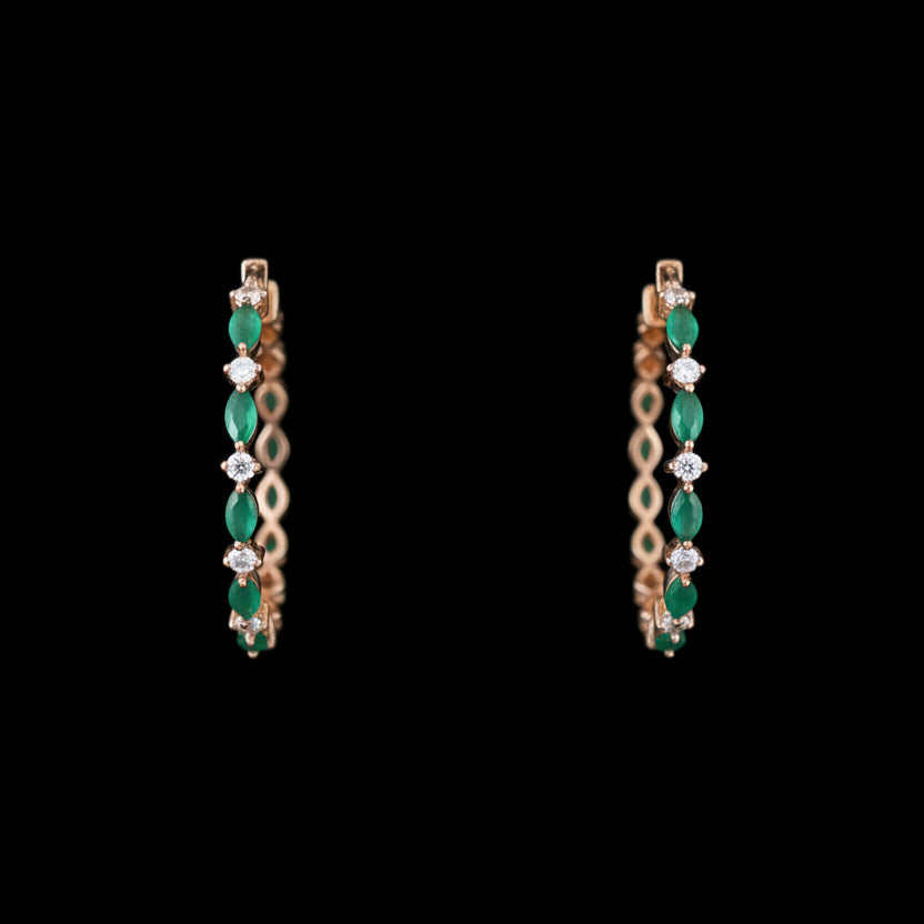 Green and gold bracelet on a gray surface with 'SAHELI' branding.