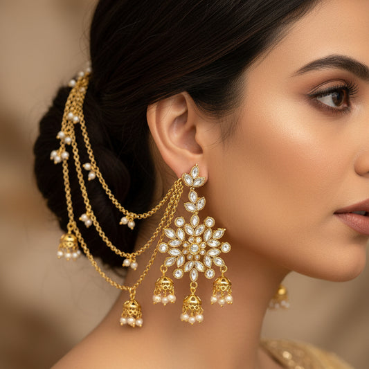 Gold and pearl jewelry set with 'SAHELI' branding on a dark background