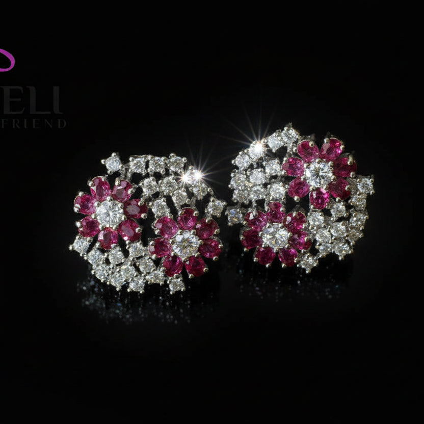 Pair of floral earrings with pink gemstones on a dark background, branded 'Saheli'.