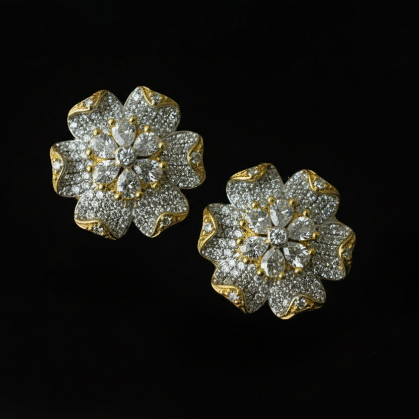 Gold and diamond earrings on a black background with 'SAHELI' branding.