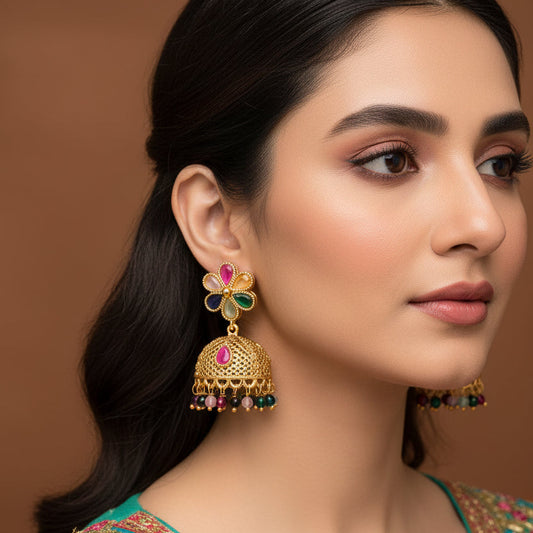 Woman wearing traditional jewelry with a brown background