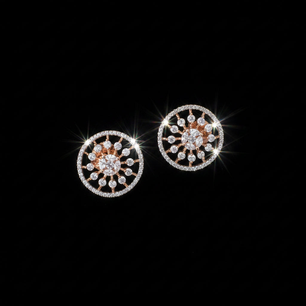 Pair of round earrings with floral design on a dark gray background