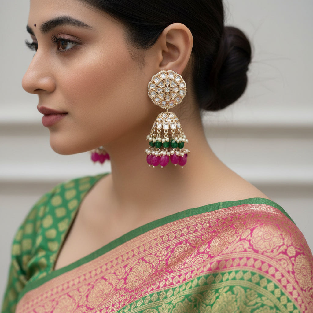 Ornate earrings with gemstones on a dark background