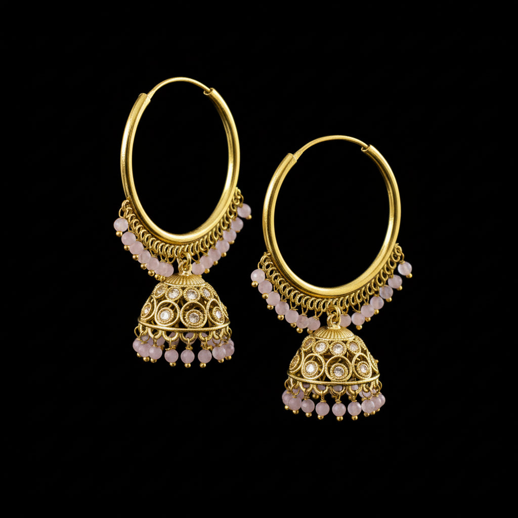 Gold hoop earrings with dangling designs on a gray stand with 'LOVO' branding.