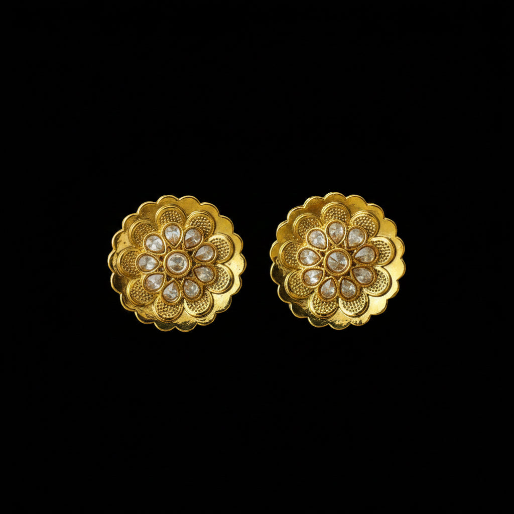Gold floral earrings with embedded stones on a dark background, branded 'Saheli'.