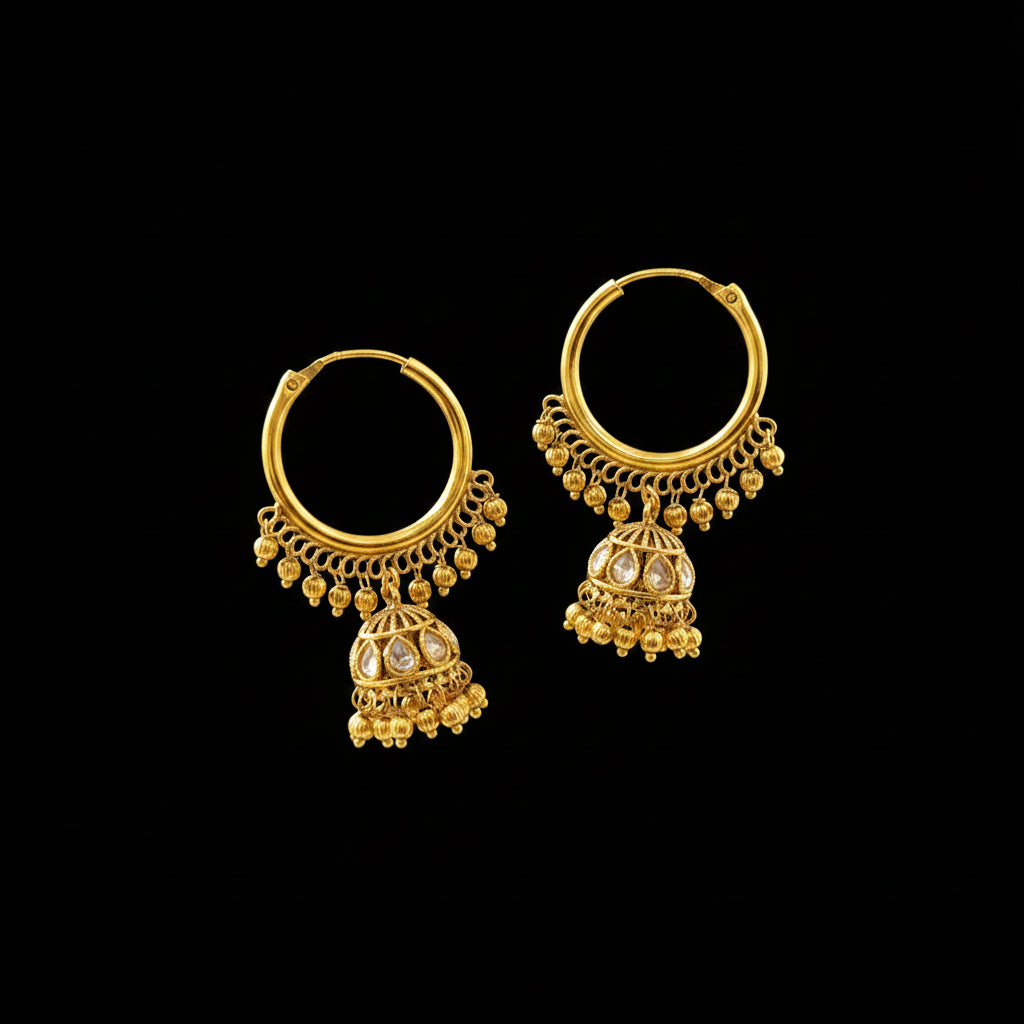 Gold earrings on a gray stand with 'SAHELI' branding.