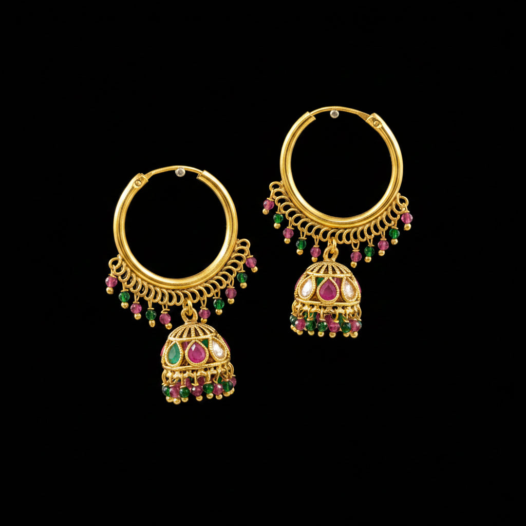 Gold earrings with colorful beads on a gray stand, branded 'Saheli'.