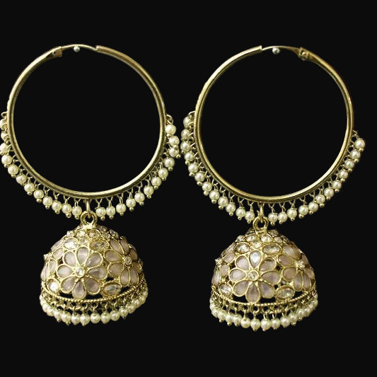 Pair of gold hoop earrings with jhumka designs on a black background