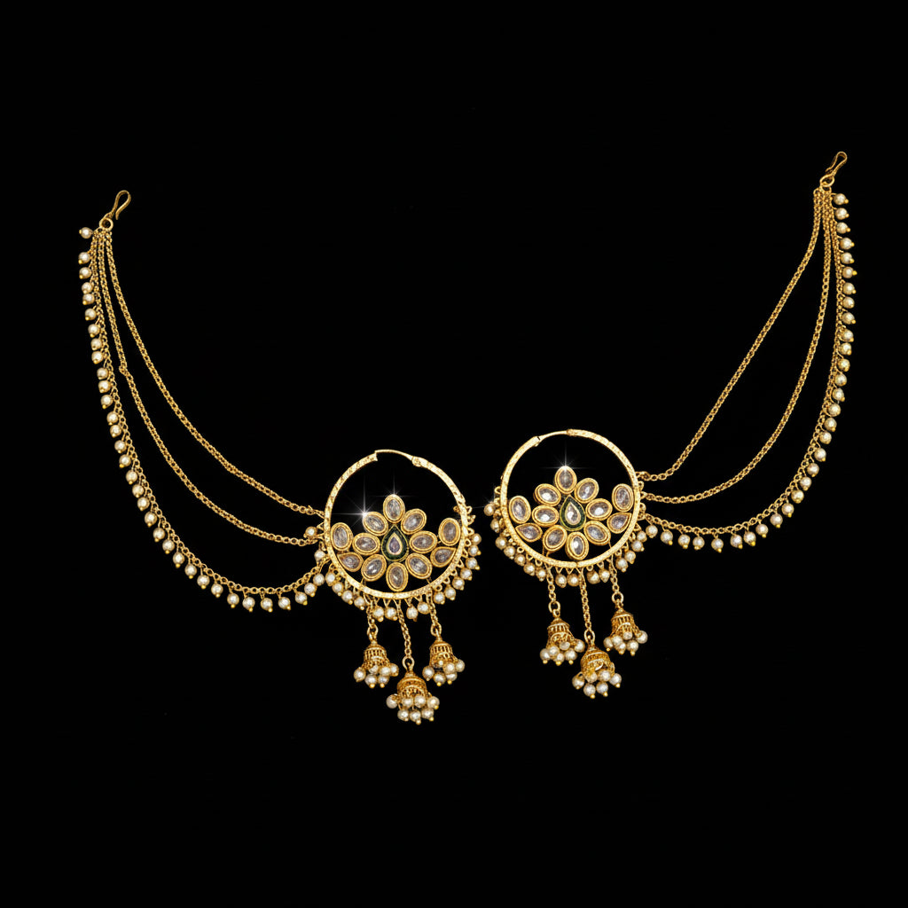 Gold necklace with intricate designs on a gray background, featuring the brand 'Saheli'.