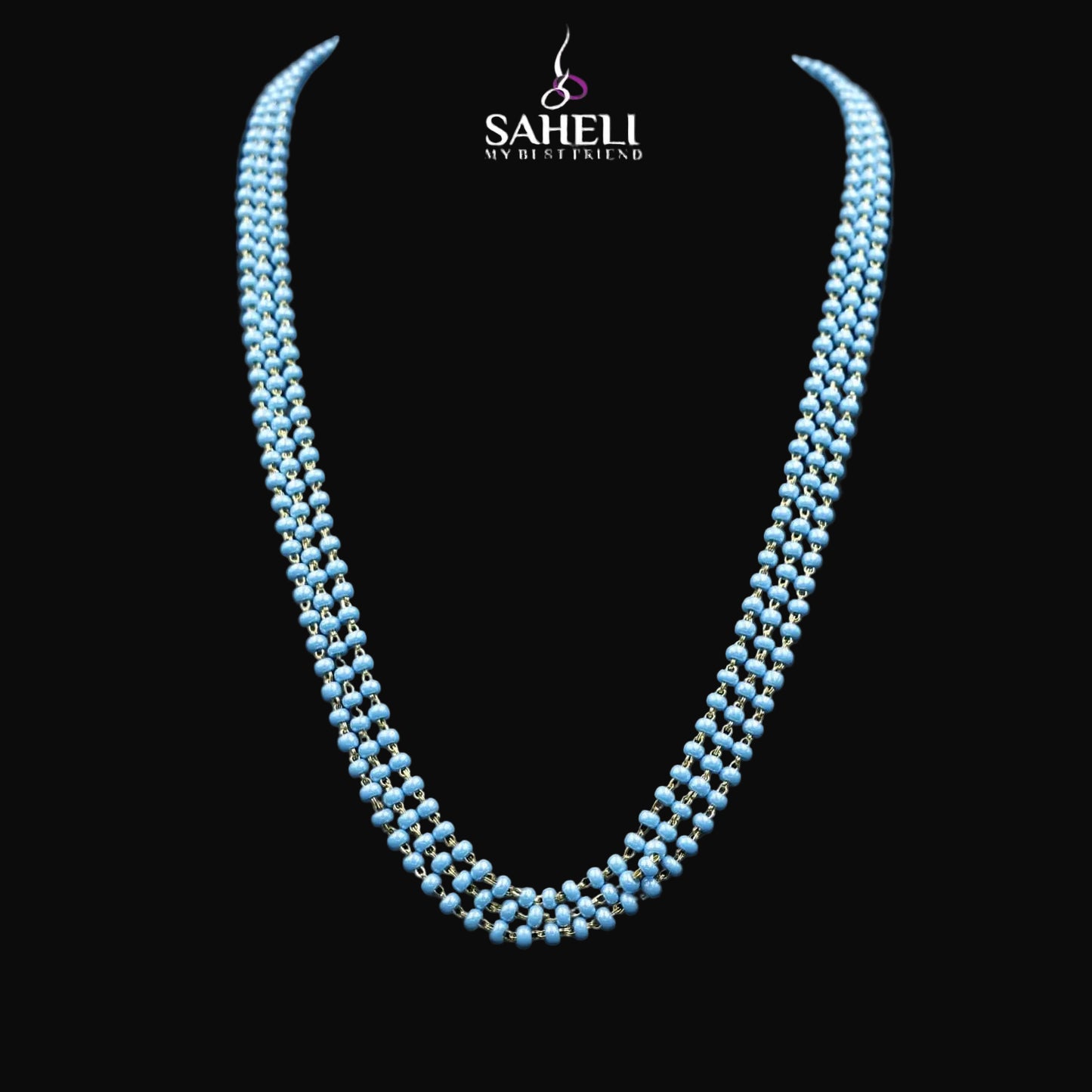 Blue beaded necklace on a black background with 'Saheli' branding.