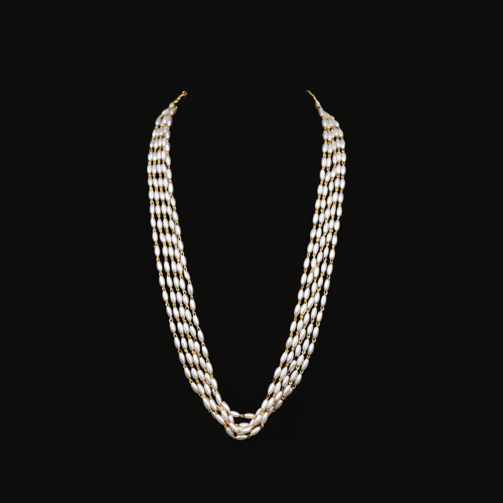 Silver chain necklace on a black background