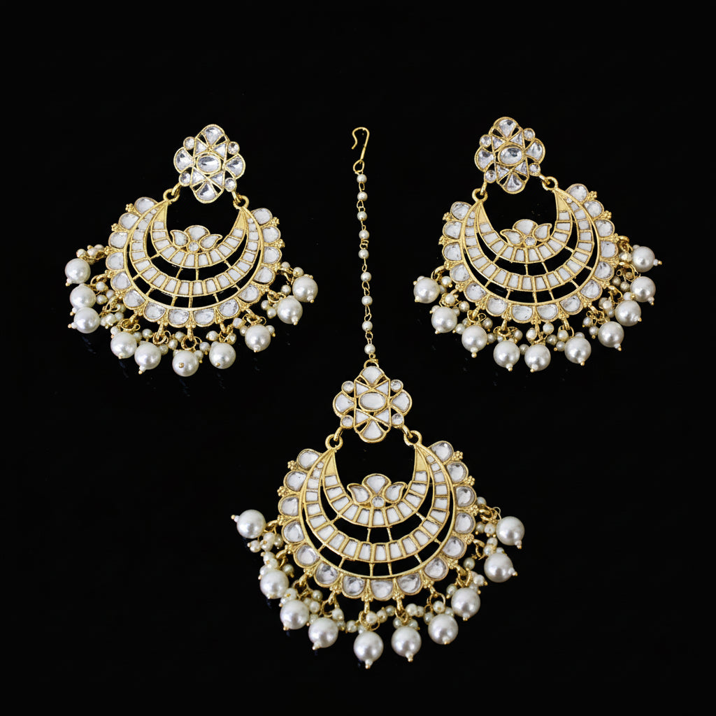 Set of pearl earrings with gold accents on a dark background, branded 'Saheli'.