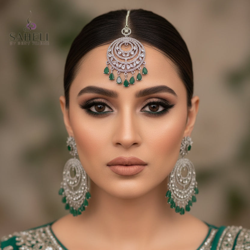 Jewelry set with earrings and necklaces on a dark background