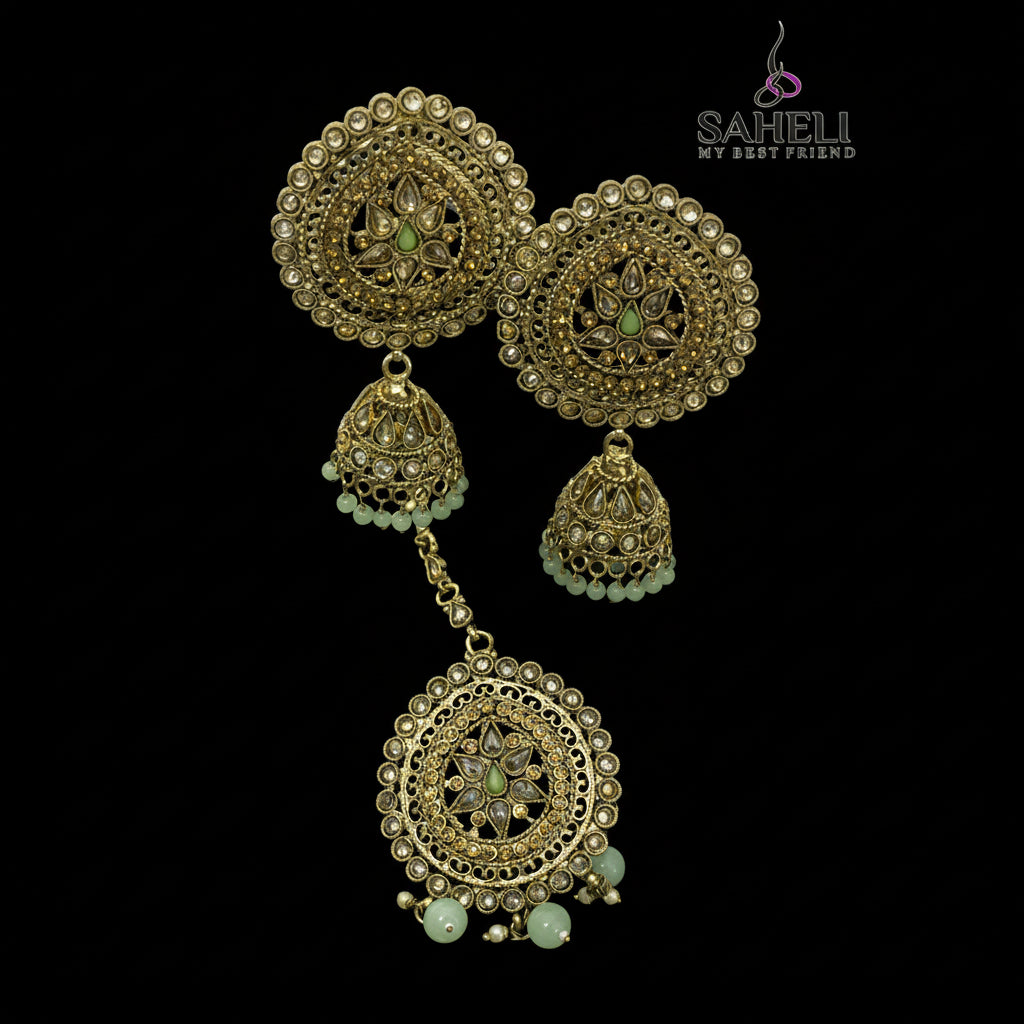 Gold and green jewelry set on a dark background with 'SAHIL' branding.