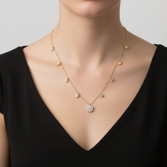 Gold necklace with diamond pendants on a black background