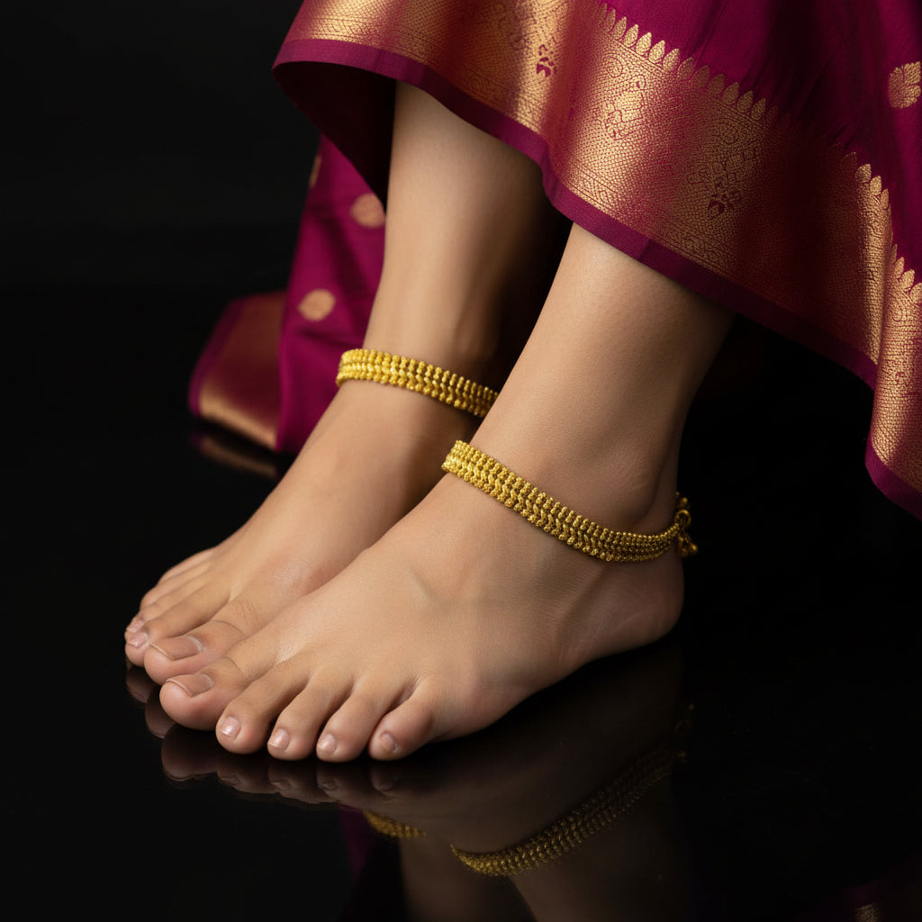 Gold necklace on a dark surface with 'Saheli' branding.