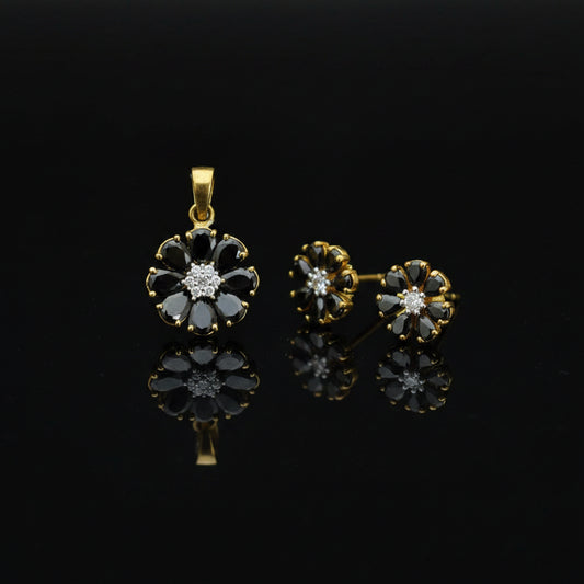 Jewelry set with pendant and earrings on a black stand, branded 'Saheli'.