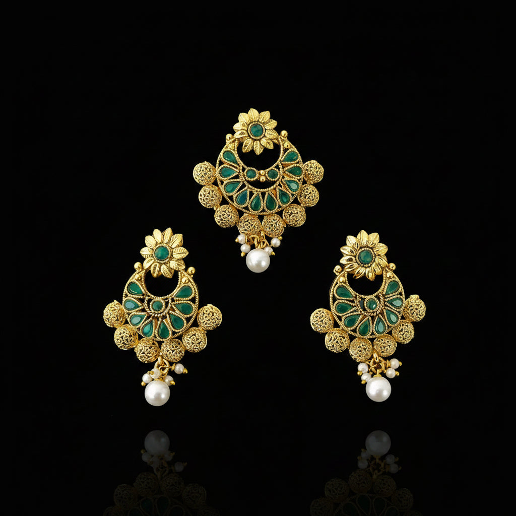 Gold and green earrings with pearl accents on a dark background, featuring the brand 'SAHELI'.