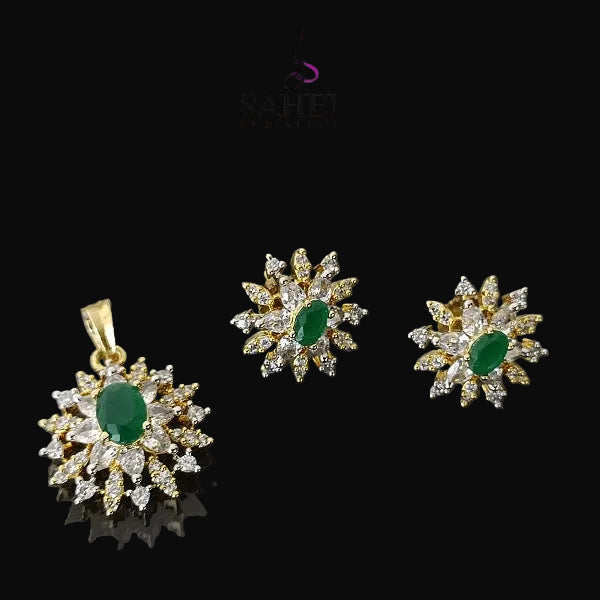 Jewelry set with pendant and earrings on a dark background, featuring the brand 'Saheli'.