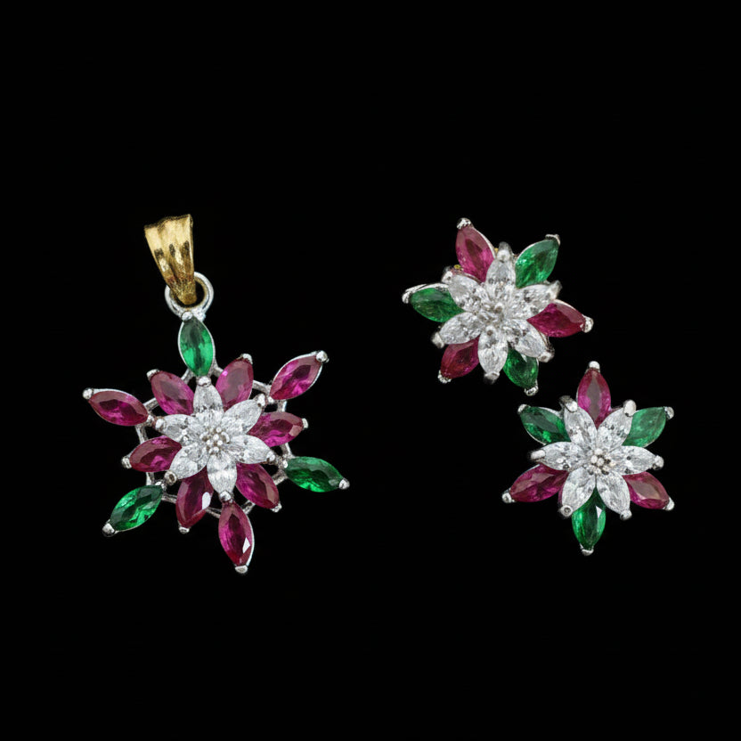 Floral earrings with pink, green, and white stones on a dark background, branded 'SAHELI'.