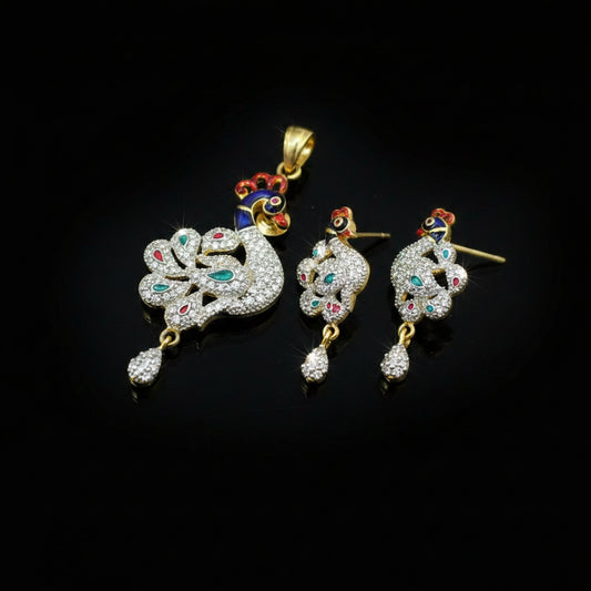 Ornate peacock-shaped earrings with gemstones on a gray background, branded 'SAHELI'.
